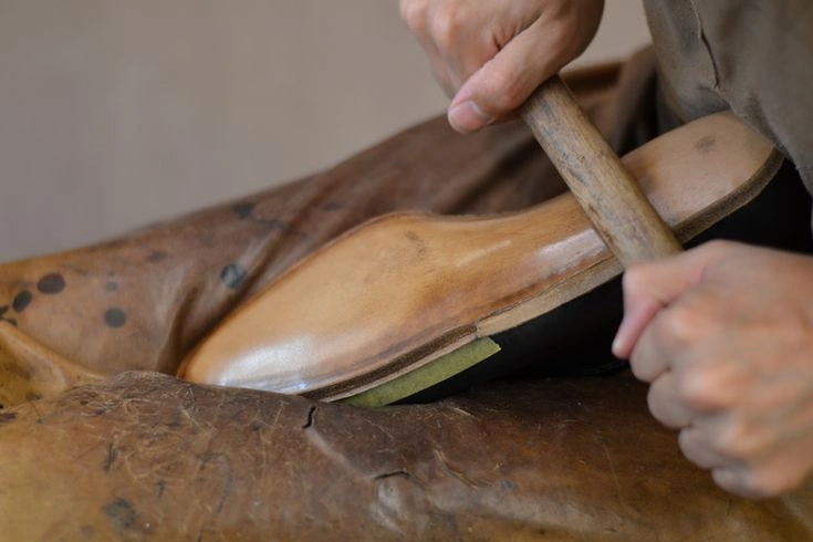 Once the upper and heel are assembled, the outsole is attached. Depending on the product positioning, outsoles may be made from leather, rubber, or composite materials.